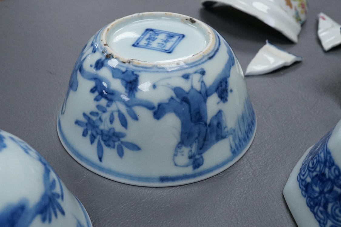 Four Chinese blue and white tea bowls and another (a.f.)